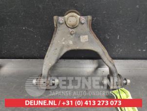 Gebruikte Draagarm Boven links-voor Mitsubishi L-200 2.5 DI-D 4x4 Prijs op aanvraag aangeboden door V.Deijne Jap.Auto-onderdelen BV
