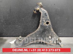 Mitsubishi L200 Draagarm onder rechts-voor O534570 foto 2