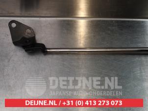 Daihatsu Sirion Gasdemper links-achter O294268 foto 2
