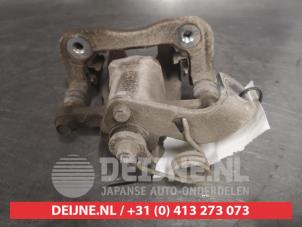 Kia Rio Rear brake calliper, right O536107 photo 2