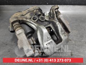 Toyota Corolla Bremszange links hinten O539276 foto 2