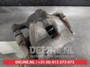Toyota Corolla Bremszange links vorne O539296 foto 3