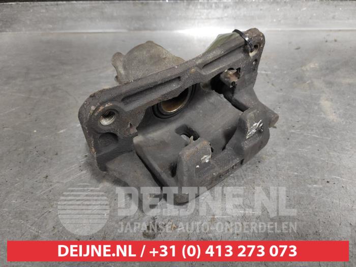 Mitsubishi Pajero Remklauw (Tang) links-achter O540335