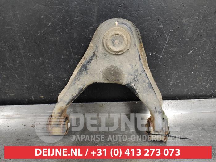 Mitsubishi L200 Draagarm boven rechts-voor O540490