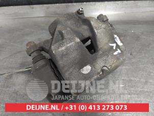 Hyundai Tucson Bremszange links vorne O540552 foto 2