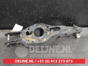Hyundai Tucson Draagarm links-achter O542284 foto 2