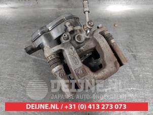 Hyundai Tucson Rear brake calliper, left O542304 photo 2