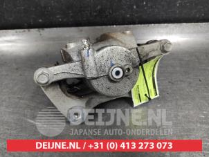 Hyundai Tucson Bremszange links vorne O542306 foto 3
