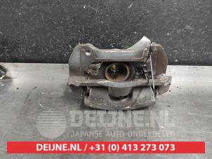 Kia Ceed Sportswagon Front brake calliper, left O542610 photo 2