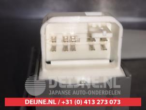 Toyota Yaris Multi-functional window switch O543139 photo 3