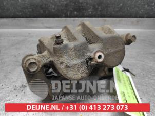 Ssang Yong Rexton Bremszange links vorne O543302 foto 2