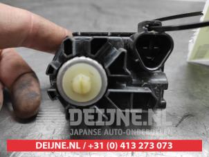 Nissan 370Z Scheinwerfermotor O543806 foto 2