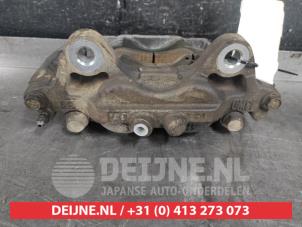 Toyota Hilux Front brake calliper, left O547490 photo 2