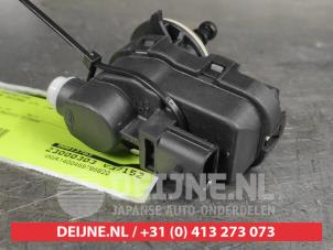 Nissan Micra Scheinwerfermotor O548214 foto 2