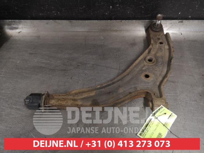 Nissan Micra Draagarm onder links-voor O549598