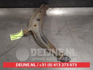 Nissan Micra Querlenker unten links vorne O549598 foto 2