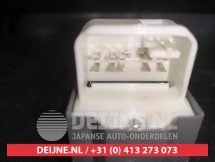 Toyota Verso-S Multi-functional window switch O550854 photo 3