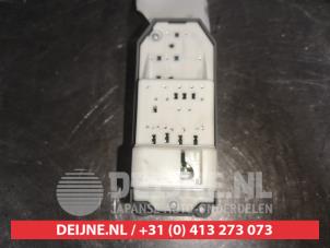 Toyota Verso-S Multi-functional window switch O550854 photo 2