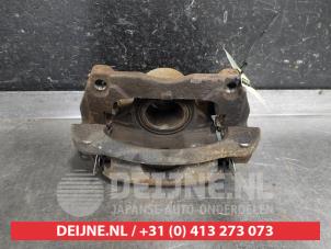 Nissan X-Trail Bremszange links vorne O551698 foto 2