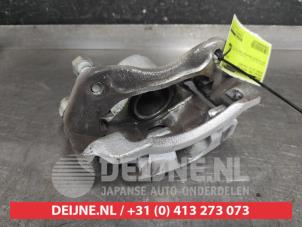 Hyundai I10 Bremszange rechts vorne O551972 foto 2