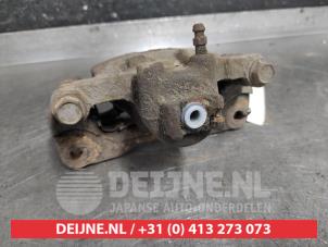 Subaru Forester Bremszange links hinten O552212 foto 3