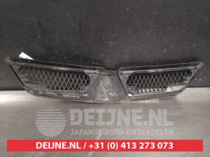 Mitsubishi Lancer Grille O553040 photo 2