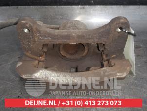 Kia Picanto Remklauw (Tang) links-voor O553975 foto 2