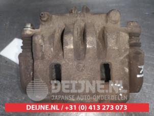 Subaru Impreza Front brake calliper, left O554061 photo 2