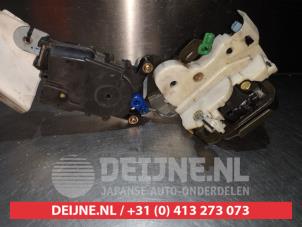 Subaru Forester Türschlossmechanik 4-türig links hinten O280186 foto 2