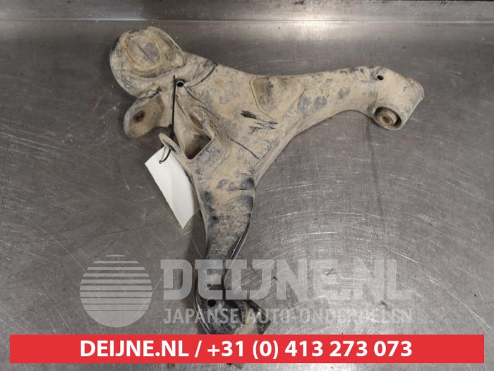 Nissan Navara Draagarm onder rechts-voor O555521