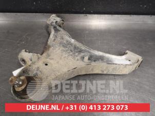 Nissan Navara Front lower wishbone, right O555521 photo 2