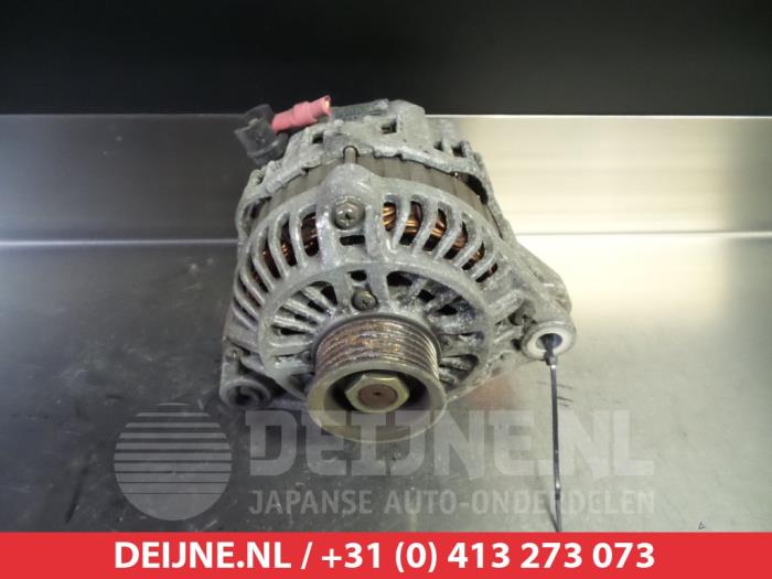 Dynamo van een Mazda 121 (JA/JB) 1.25i 16V 1996