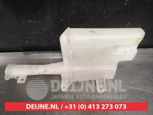 Mazda 323F Scheibensprühertank vorne O555570 foto 2
