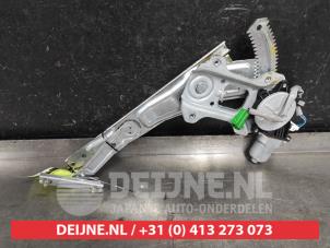 Subaru Forester Fenstermechanik 4-türig rechts hinten O556071 foto 2