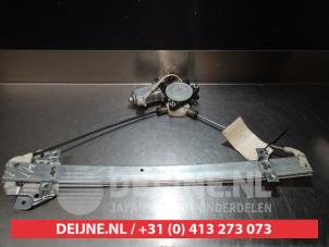 Suzuki Liana Fenstermechanik 4-türig links vorne O275983 foto 2