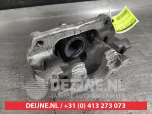 Nissan Juke Front brake calliper, left O556849 photo 2