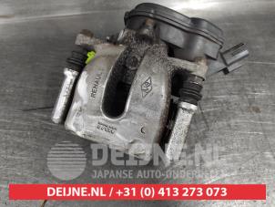 Nissan Juke Rear brake calliper, left O556854 photo 2