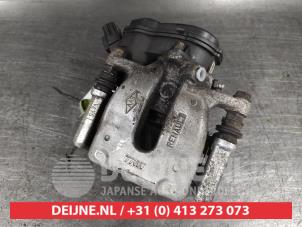 Nissan Juke Rear brake calliper, right O556855 photo 2