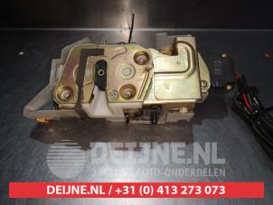 Mazda 323F Rear door mechanism 4-door, right O281319 photo 3