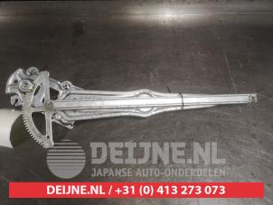 Toyota Yaris Window mechanism 4-door, front right O557538 photo 2