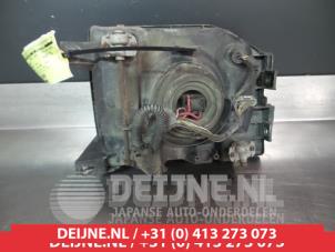 Mitsubishi Pajero Scheinwerfer links O266596 foto 2