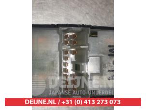 Nissan Almera Multi-functional window switch O311619 photo 2