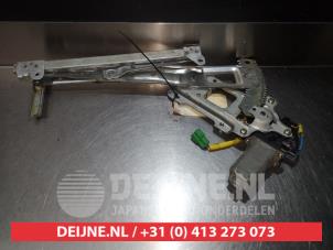 Subaru Legacy Fenstermechanik 4-türig links hinten O290497 foto 2