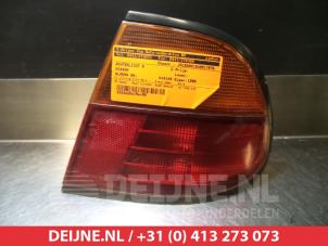 Gebruikte Achterlicht rechts Nissan Almera (N15) Prijs € 20,00 Margeregeling aangeboden door V.Deijne Jap.Auto-onderdelen BV