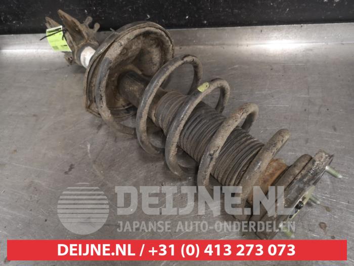 Kia Sportage Schokdemperpoot links-achter O560260