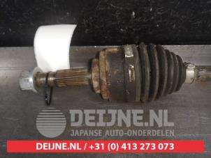 Nissan Cube Front drive shaft, left O560438 photo 2