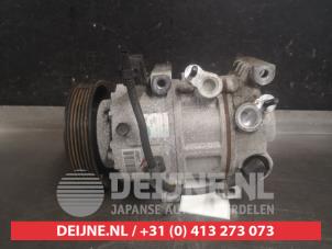 Kia Sportage Klimapumpe O560602 foto 2