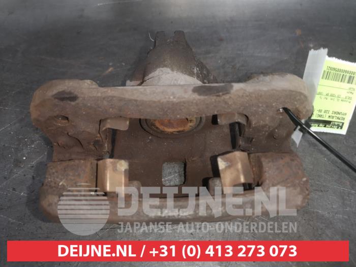 Hyundai I20 Remklauw (Tang) links-achter O560821