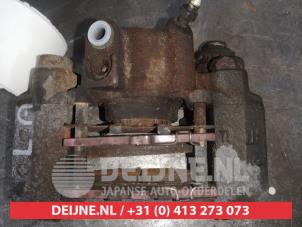 Toyota Prius Bremszange links hinten O560833 foto 2