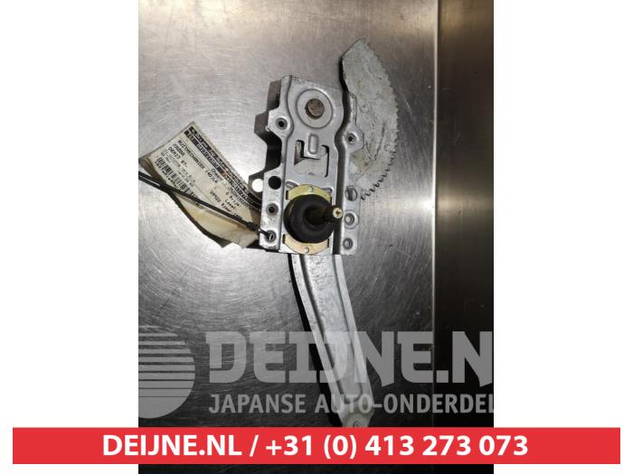 Mazda Demio Fenstermechanik 4-türig links hinten O290279